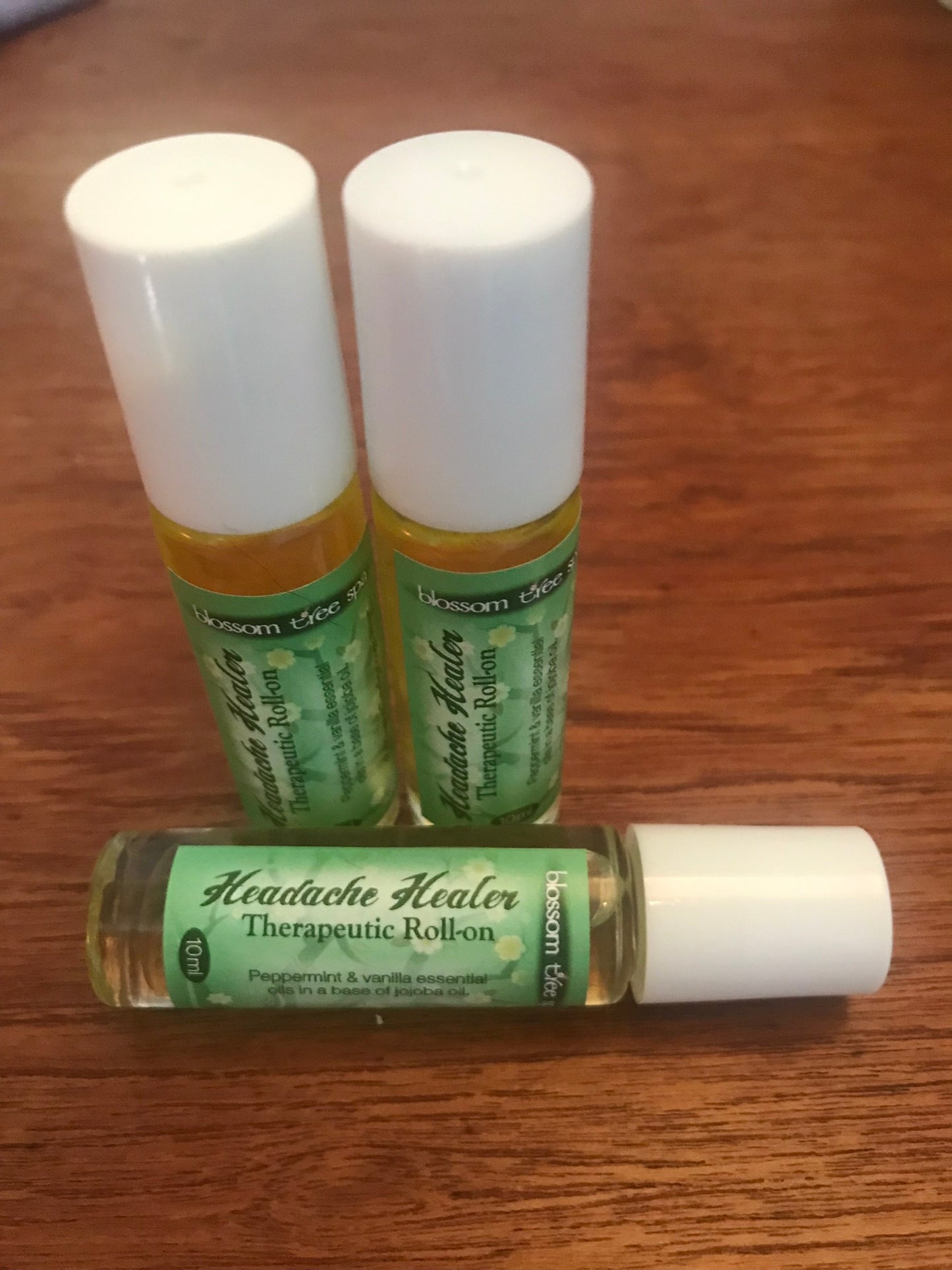 Headache-healer therapeutic roll-on